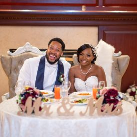 bride & groom smiling