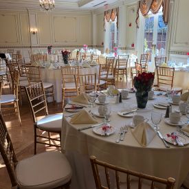 Tables set up in conservatory room
