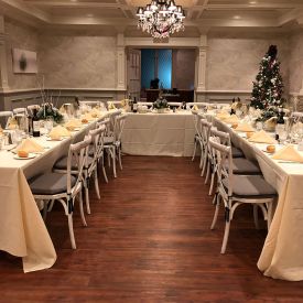 Tables set for holiday party in the Savannah Room